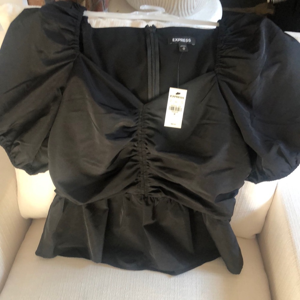 Ruched sleeve peplum top